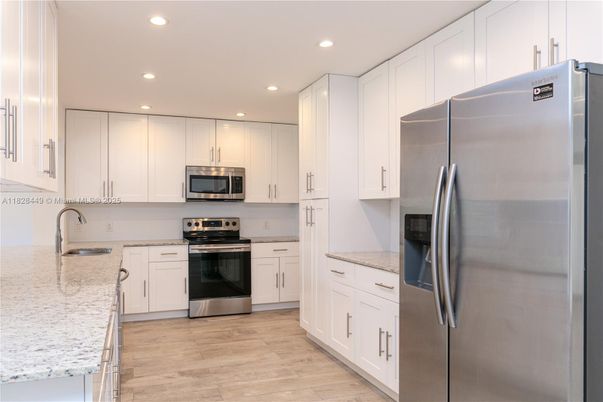 Interior, Kitchen, Recessed Lighting, Stainless Steel Appliances, Wood Texture Flooring