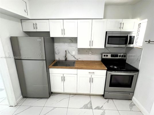 Interior, Kitchen, Marble, Marble Walls, Stainless Steel Appliances
