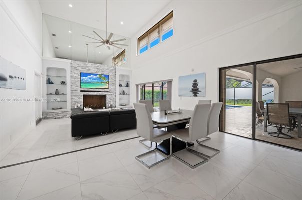 Dining room, Fireplace, Interior, Living room, Marble, Pendant Lights, Recessed Lighting