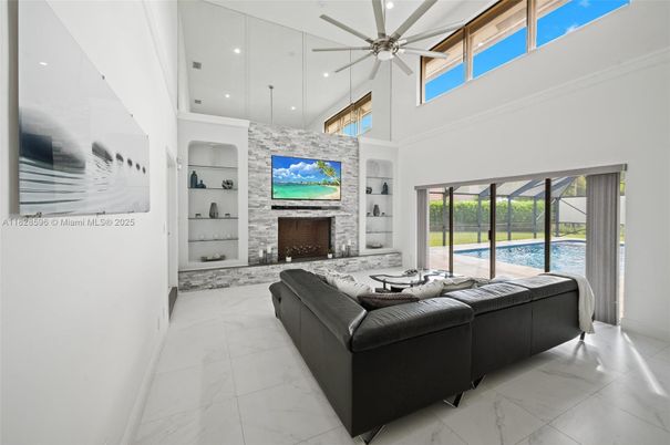 Fireplace, Interior, Living room, Marble, Pendant Lights, Recessed Lighting, Stone Walls, Water