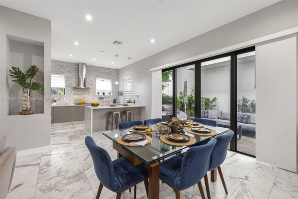 Dining room, Interior, Kitchen, Marble, Pendant Lights, Recessed Lighting, Stainless Steel Appliances