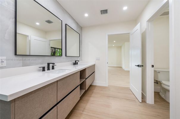 Bathroom, Dual Sink Vanities, Interior, Recessed Lighting, Wood Texture Flooring