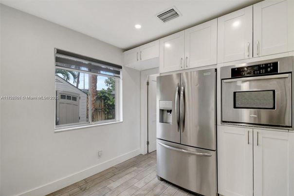Interior, Kitchen, Recessed Lighting, Stainless Steel Appliances, Wood Texture Flooring