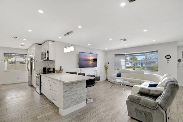 Interior, Kitchen, Living room, Pendant Lights, Recessed Lighting, Stainless Steel Appliances, Wood Texture Flooring