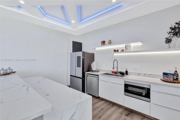 Interior, Kitchen, Recessed Lighting, Stainless Steel Appliances, Wood Texture Flooring