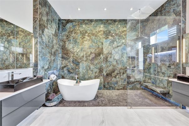 Bathroom, Free Standing Baths, Glass Shower, Interior, Marble, Marble Walls, Recessed Lighting