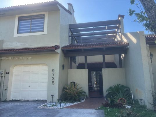 Attached, Exterior, Facade, Spanish Mediterranean