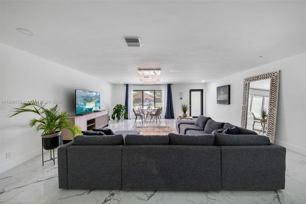 Chandelier, Dining room, Fireplace, Interior, Living room, Marble, Recessed Lighting