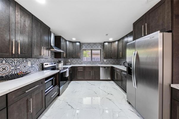 Interior, Kitchen, Marble, Recessed Lighting, Stainless Steel Appliances