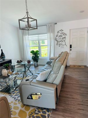Dining room, Interior, Living room, Pendant Lights, Wood Texture Flooring