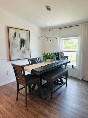 Dining room, Interior, Pendant Lights, Wood Texture Flooring