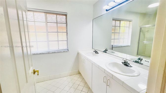 Bathroom, Dual Sink Vanities, Glass Shower, Interior, Recessed Lighting, Tile Countertops