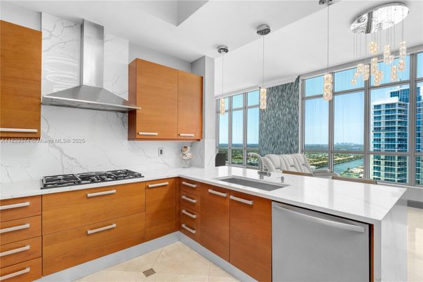 Interior, Kitchen, Marble Walls, Pendant Lights, Stainless Steel Appliances, Water