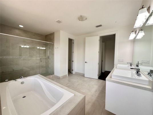 Bathroom, Dual Sink Vanities, Glass Shower, Interior, Recessed Lighting