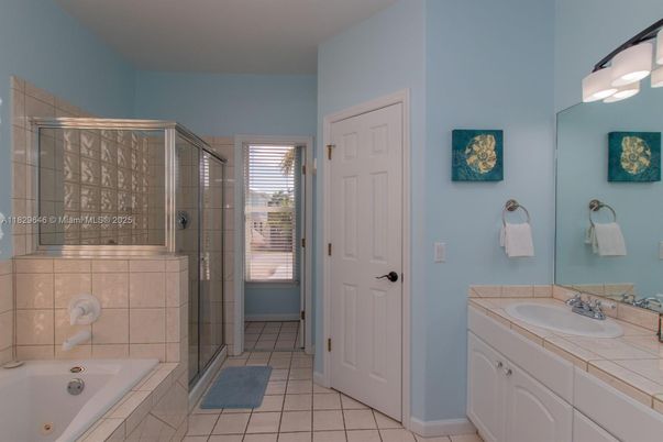 Bathroom, Dual Sink Vanities, Glass Shower, Interior, Tile Countertops