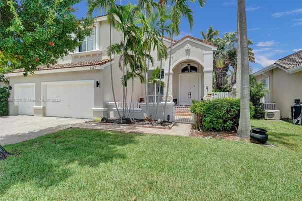 Attached, Backyard, Exterior, Facade, Spanish Mediterranean