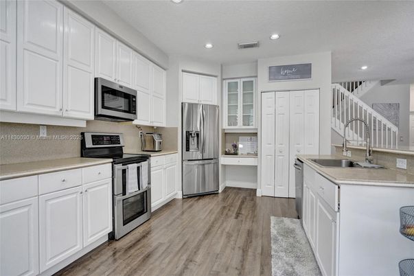 Interior, Kitchen, Recessed Lighting, Stainless Steel Appliances, Wood Texture Flooring