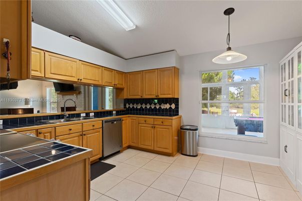 Interior, Kitchen, Pendant Lights, Stainless Steel Appliances, Tile Countertops