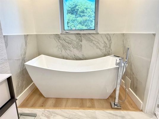 Bathroom, Free Standing Baths, Interior, Marble, Marble Walls, Wood Texture Flooring