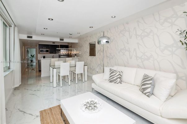 Dining room, Interior, Kitchen, Living room, Marble, Marble Walls, Pendant Lights, Recessed Lighting, Stainless Steel Appliances