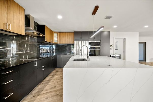 Interior, Kitchen, Pendant Lights, Recessed Lighting, Stainless Steel Appliances, Wood Texture Flooring