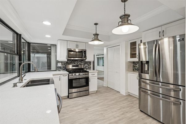 Interior, Kitchen, Pendant Lights, Recessed Lighting, Stainless Steel Appliances, Wood Texture Flooring