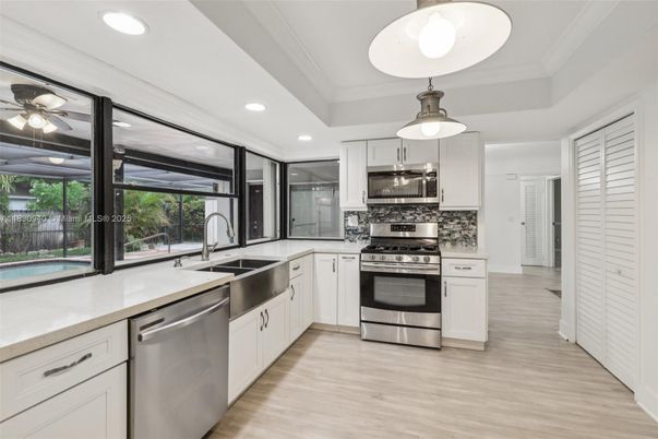 Interior, Kitchen, Recessed Lighting, Stainless Steel Appliances, Wood Texture Flooring