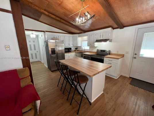 Chandelier, Interior, Kitchen, Pendant Lights, Stainless Steel Appliances, Wooden Beams, Wooden Ceilings, Wood Texture Flooring