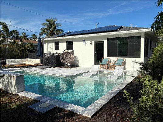 Exterior, Pool, Solar Panels