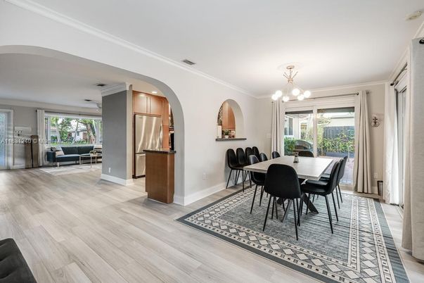 Chandelier, Dining room, Interior, Kitchen, Recessed Lighting, Stainless Steel Appliances, Wood Texture Flooring