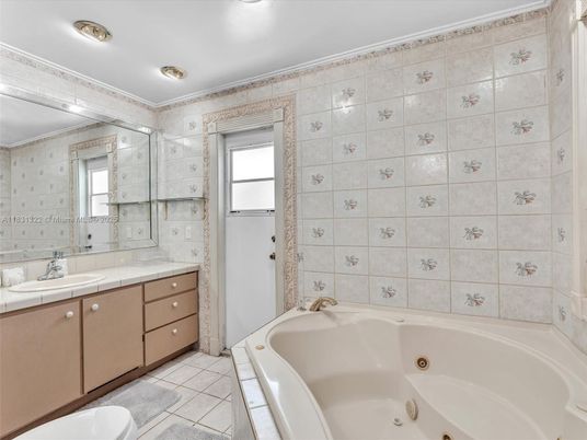 Bathroom, Dual Sink Vanities, Interior, Recessed Lighting, Tile Countertops