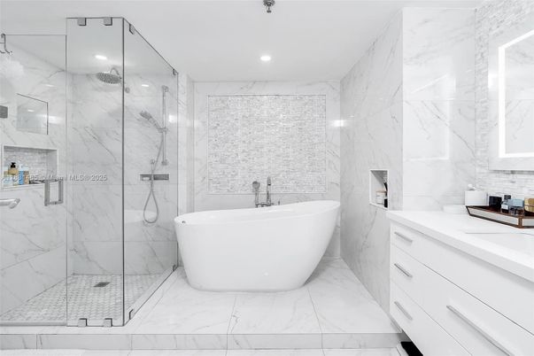 Bathroom, Free Standing Baths, Glass Shower, Interior, Marble, Marble Walls, Recessed Lighting