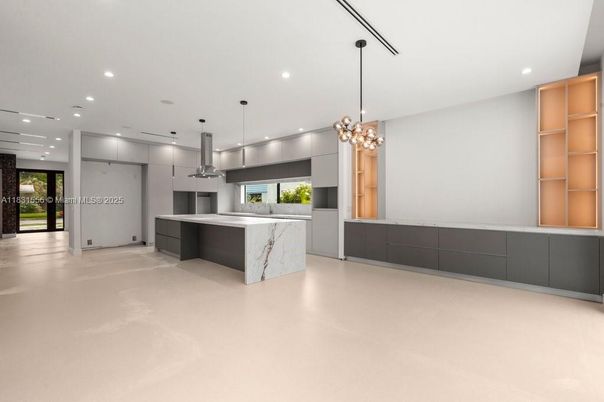 Interior, Kitchen, Marble Walls, Pendant Lights, Recessed Lighting, Stainless Steel Appliances