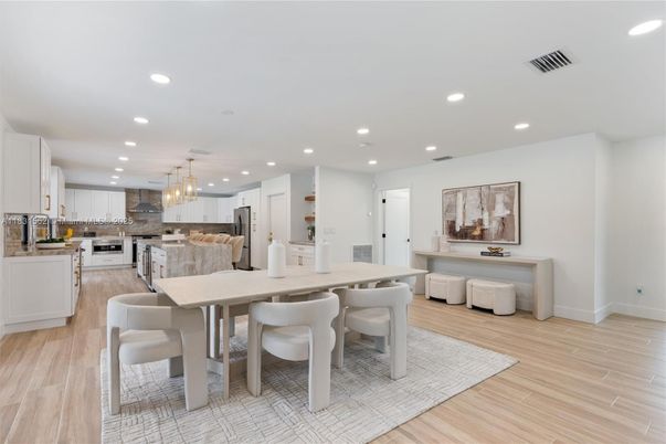 Dining room, Interior, Kitchen, Pendant Lights, Recessed Lighting, Stainless Steel Appliances, Wood Texture Flooring