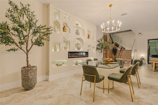 Chandelier, Dining room, Fireplace, Interior, Pendant Lights