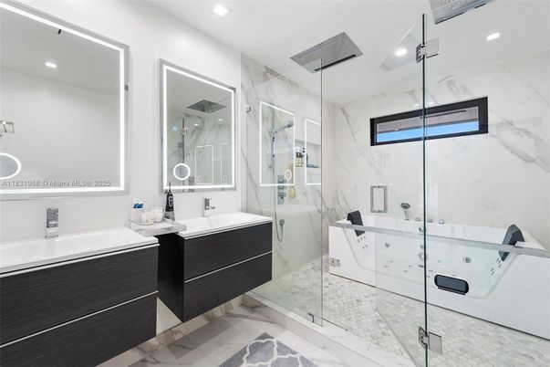 Bathroom, Dual Sink Vanities, Glass Shower, Interior, Marble, Marble Walls, Recessed Lighting