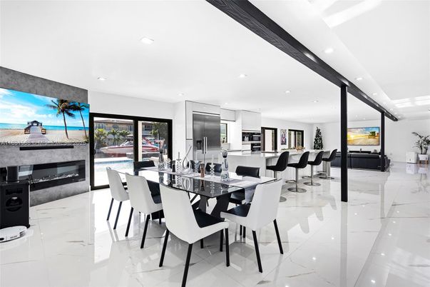 Dining room, Fireplace, Interior, Kitchen, Marble, Recessed Lighting, Stainless Steel Appliances, Water
