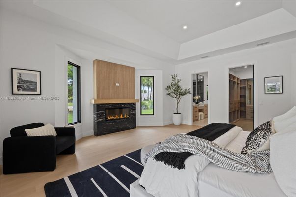 Bedroom, Fireplace, Interior, Recessed Lighting, Wood Texture Flooring