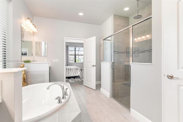 Bathroom, Bedroom, Glass Shower, Interior, Recessed Lighting, Wood Texture Flooring