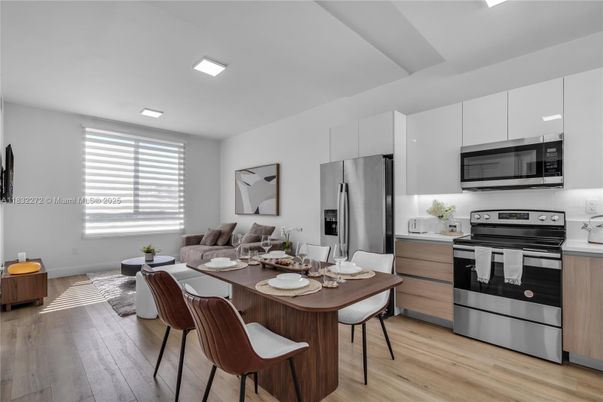 Dining room, Interior, Kitchen, Recessed Lighting, Stainless Steel Appliances, Wood Texture Flooring