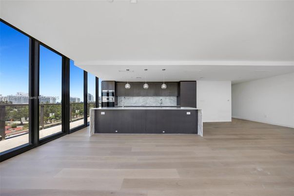 Interior, Kitchen, Marble Walls, Pendant Lights, Stainless Steel Appliances, Wood Texture Flooring