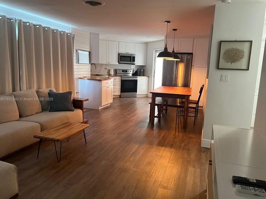 Dining room, Interior, Kitchen, Living room, Pendant Lights, Recessed Lighting, Stainless Steel Appliances, Wood Texture Flooring
