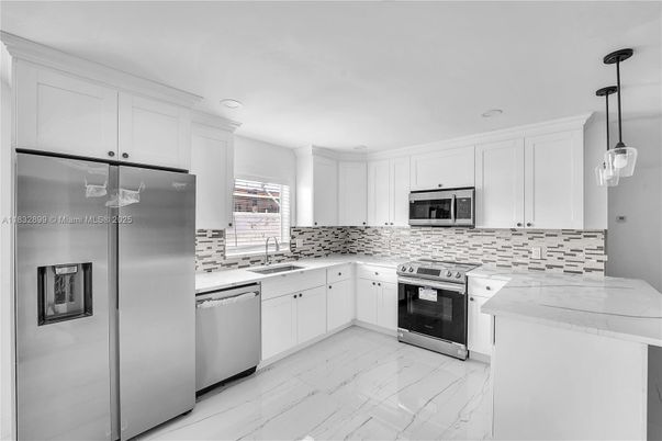 Interior, Kitchen, Marble, Pendant Lights, Recessed Lighting, Stainless Steel Appliances