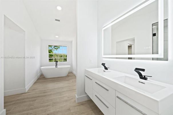 Bathroom, Dual Sink Vanities, Free Standing Baths, Interior, Recessed Lighting, Wood Texture Flooring