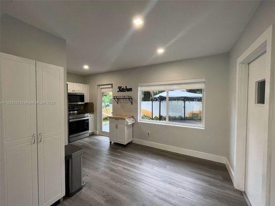 Interior, Kitchen, Recessed Lighting, Stainless Steel Appliances, Wood Texture Flooring