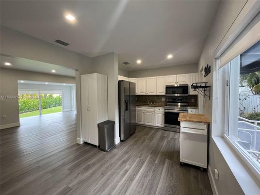 Interior, Kitchen, Recessed Lighting, Stainless Steel Appliances, Wood Texture Flooring