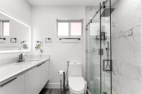 Bathroom, Glass Shower, Interior, Marble Walls, Wood Texture Flooring