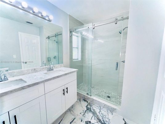Bathroom, Dual Sink Vanities, Glass Shower, Interior, Marble, Marble Walls