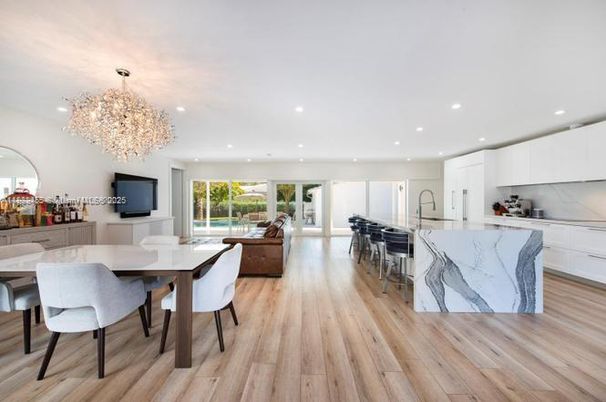 Chandelier, Dining room, Interior, Kitchen, Recessed Lighting, Stainless Steel Appliances, Wood Texture Flooring