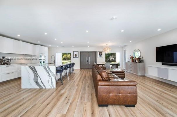 Chandelier, Interior, Kitchen, Living room, Recessed Lighting, Stainless Steel Appliances, Wood Texture Flooring
